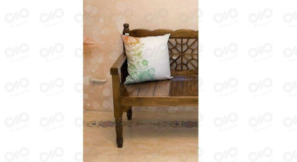 پرده دکوپیک سری پرنیا کد 14 به همراه یک عدد کوسن - تصویر کوسن در دکوراسیون خانه روی صندلی قهوه ای