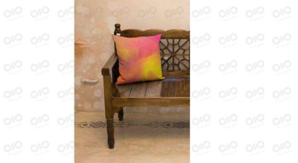 پرده سری پرنیا کد 12 به همراه یک عدد کوسن-تصویر کوسن روی صندلی چوبی طرح دار